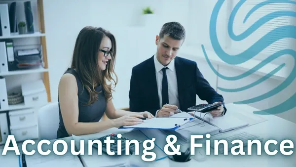  A male and female colleague using a calculator and reviewing forms in an office setting with the Specialized Recruiting Group Logo and the words Accounting and Finance written over the top of the image